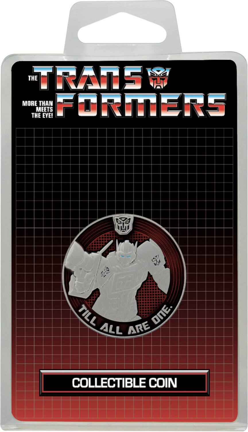 THE TRANSFORMERS  
MORE THAN MEETS THE EYE!  
TILL ALL ARE ONE.  
COLLECTIBLE COIN
