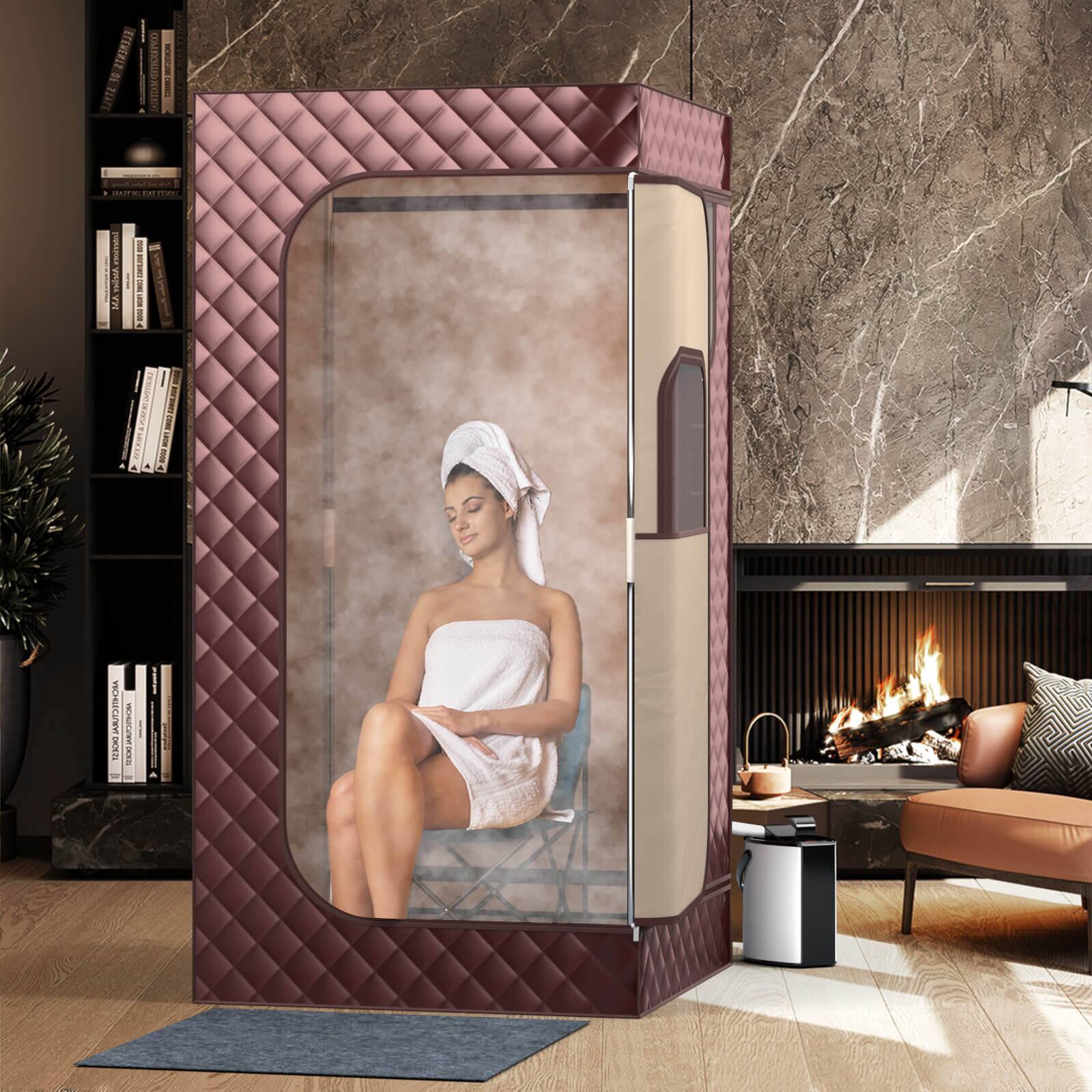 The image features a woman sitting in a sauna, which is a small room with a chair and a fireplace. The woman is wrapped in a towel, and there is a potted plant nearby. The scene also includes a bookshelf with several books on it, and a couch in the background. The woman appears to be enjoying her time in the sauna, which is a relaxing and therapeutic experience.