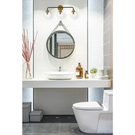 Living District - Hanson 3 lights bath sconce in black with brass with clear shade - Black And Brass And Clear Shade