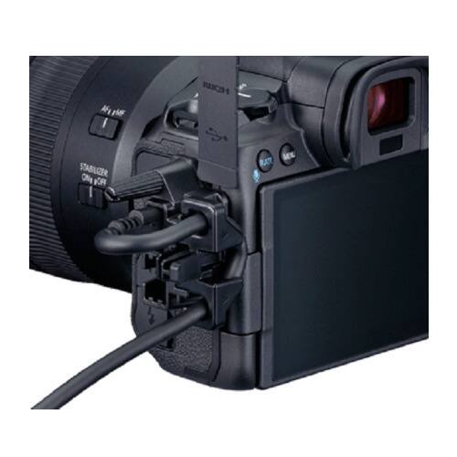 A Panasonic camera with a stabilizer attached to it.