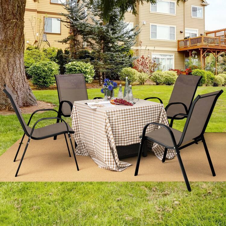 Angle. Mondawe - Set of 4 Stackable Patio Dining Chairs with Armrests and Breathable Fabric Seat - Brown.