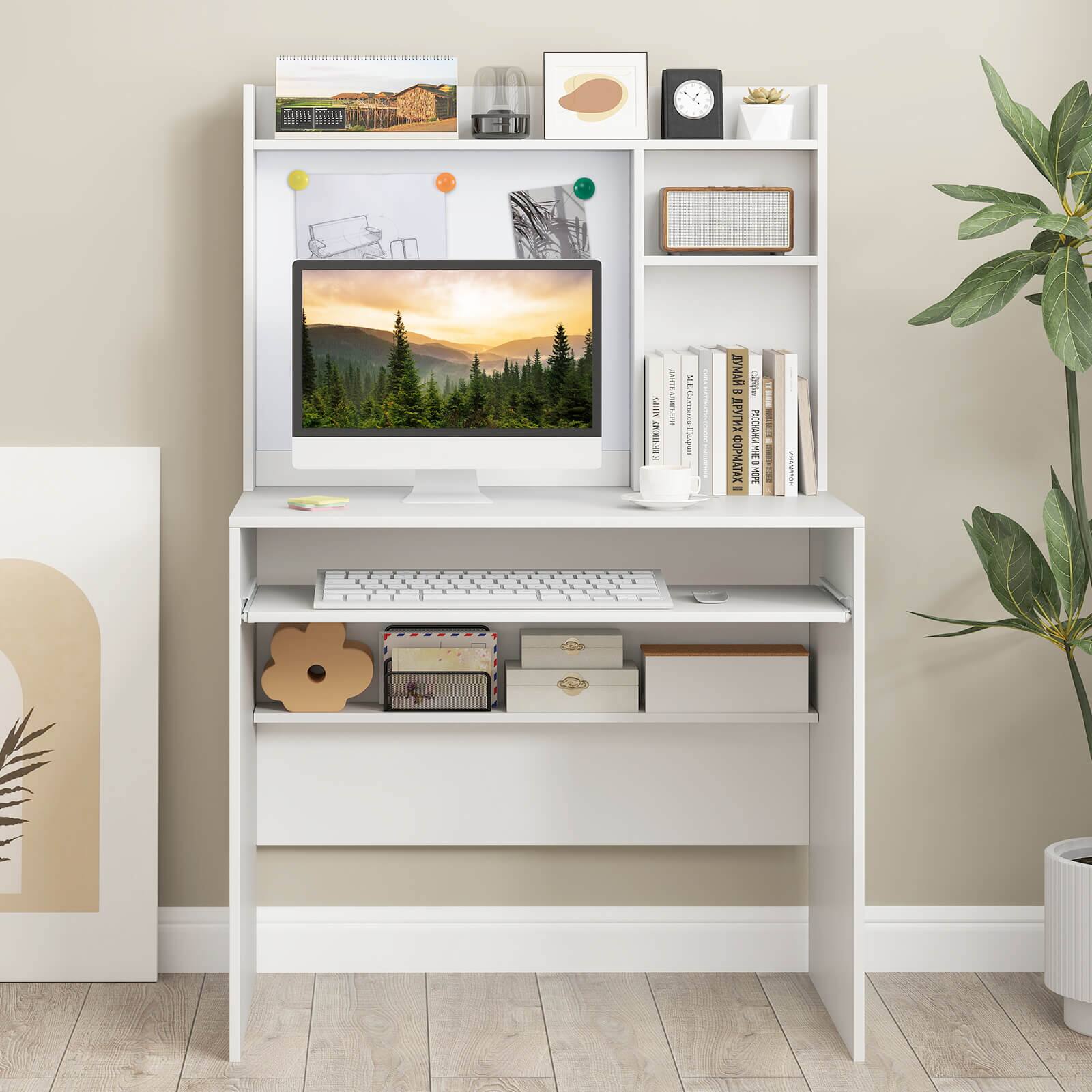 The image features a white desk with a computer monitor, keyboard, and mouse on it. There are also several books and a clock on the desk. A potted plant is placed next to the desk, and a picture is hanging on the wall above it. The desk is organized and ready for use.