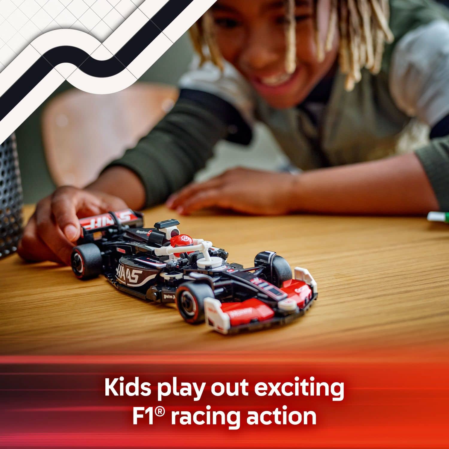 Kids play out exciting F1 racing action.
