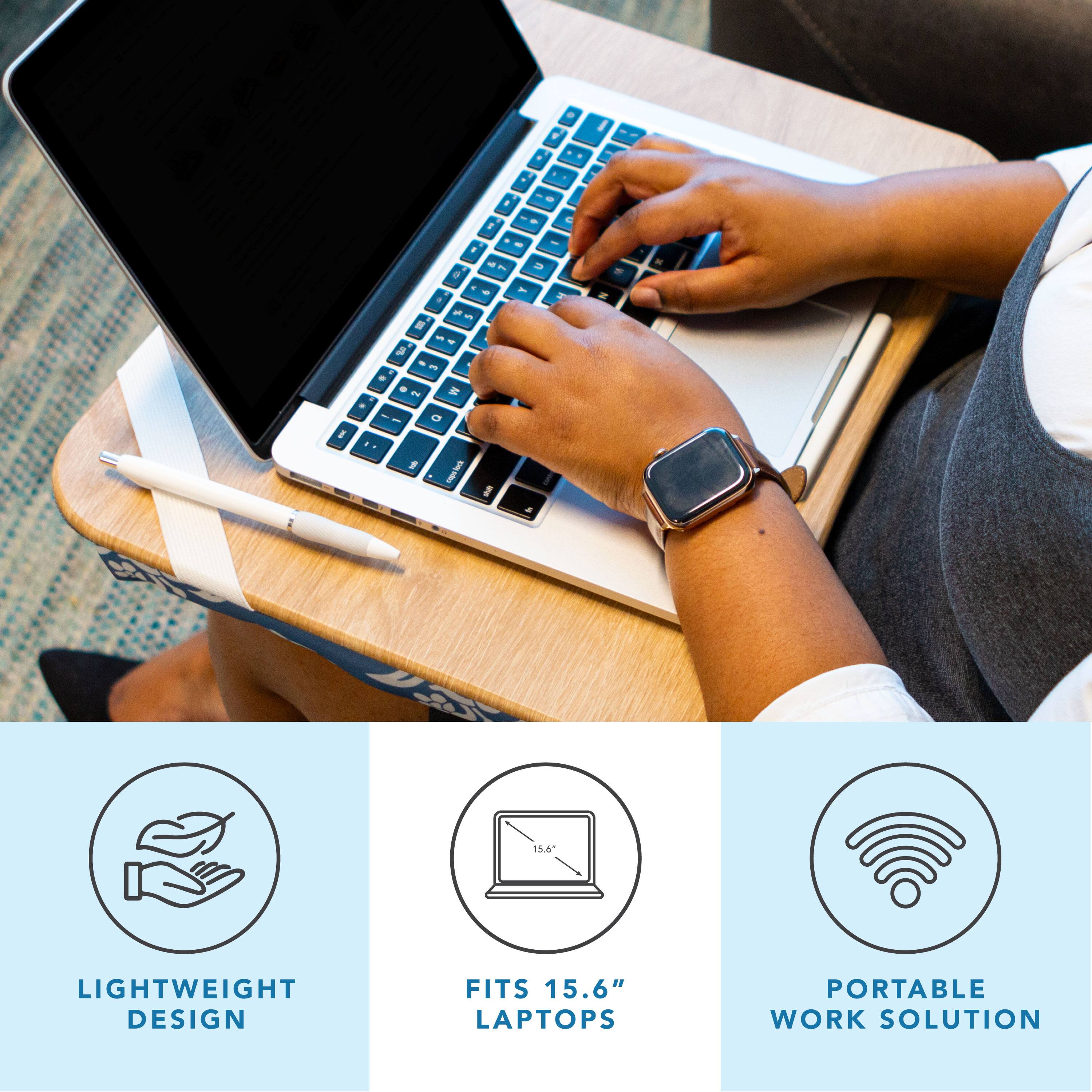 A person is using a laptop computer on a desk. The laptop is lightweight and designed to fit 15.6" laptops. It is a portable work solution.