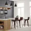 Left. Simpli Home - Roland Mid Century Modern swivel bar stool in black vegan faux leather - Black.