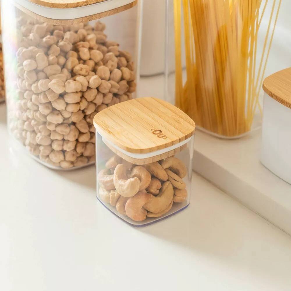 Left. OU - OU Airtight Food Storage Container Set w Bamboo Lid 8pc (set of 4) Plastic Storage Container - Clear.