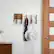 Angle. TRINITY - DRAKESTONE | Mid-Century Coat Rack w/ 5 Wooden Hooks | White - White.