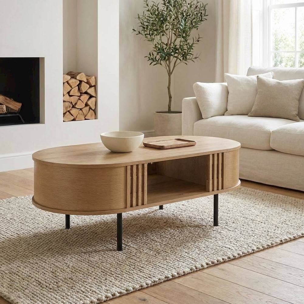Left. FurniFact - Earth-toned Oval Wood Coffee Table with Cam Bolt and Metal Accents - Brown.