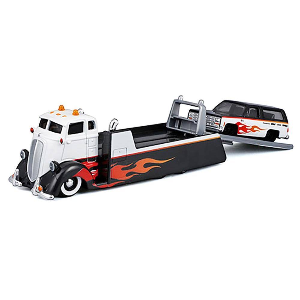 Angle. Maisto - COE Flatbed Truck & 1979 Chevrolet K5 Blazer Black White Flame Graphics Elite Transport Series 1/64 Model - Black, White.