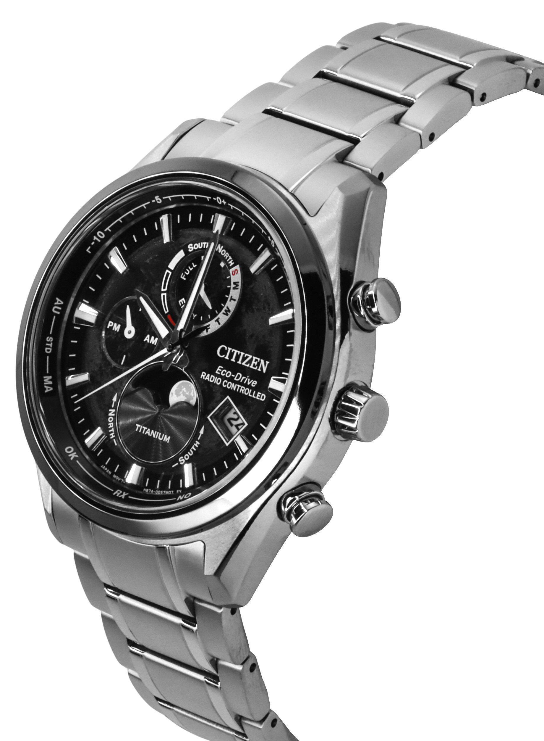 5 0+ AU STD MA OK 10 SOUTI NORTH FULL S M E T PM Y WIMIN F - T W AM CITIZEN RADIO Eco-Drive CONTROLLED NORTH- 24 TITANIUM SOUTH JAPAN MOVT 74-057 MIT DT RX NO