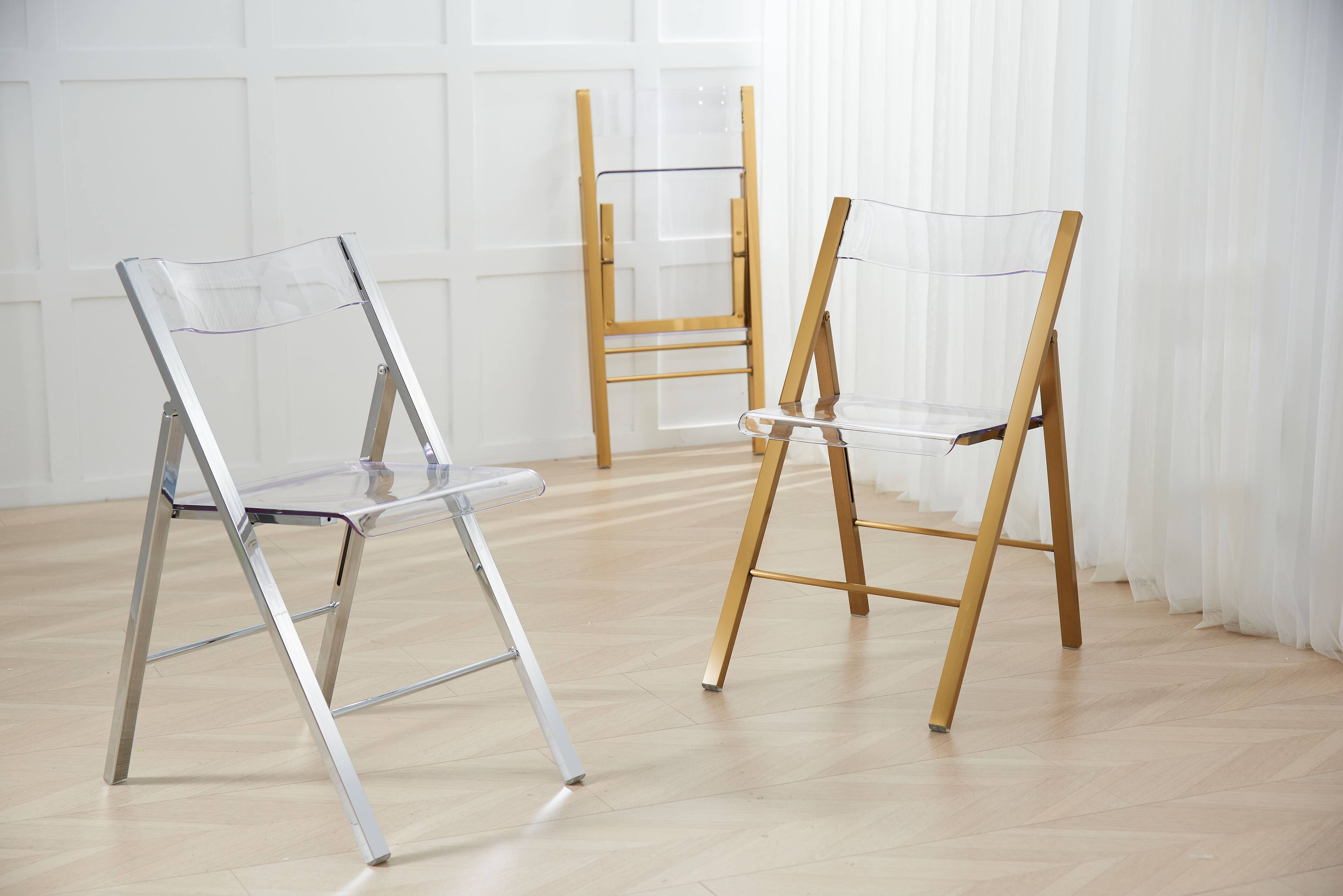 Back. LeisureMod - Menno Brushed Gold Acrylic Folding Dining Chair with Waterfall Seat & Stainless Steel Frame - Set of 2.