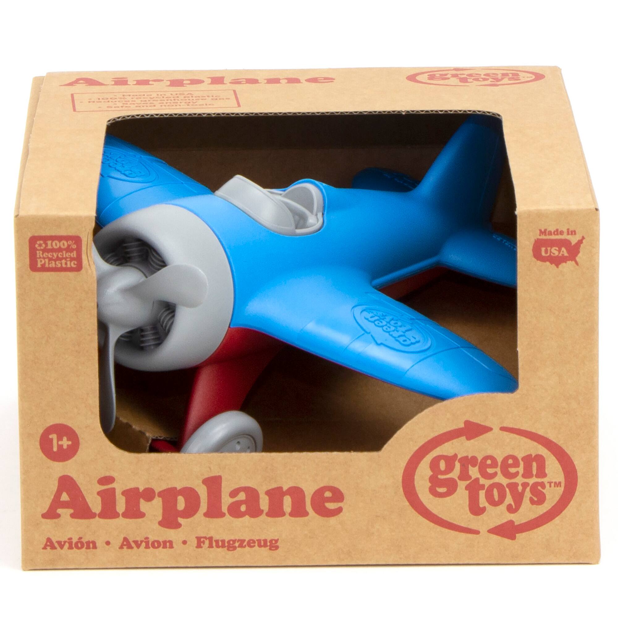 The text on the image reads: "Airplane G100% Recycled Plastic Made in USA freen o 1+ green toys TM Airplane Avin Avion Flugzeug."