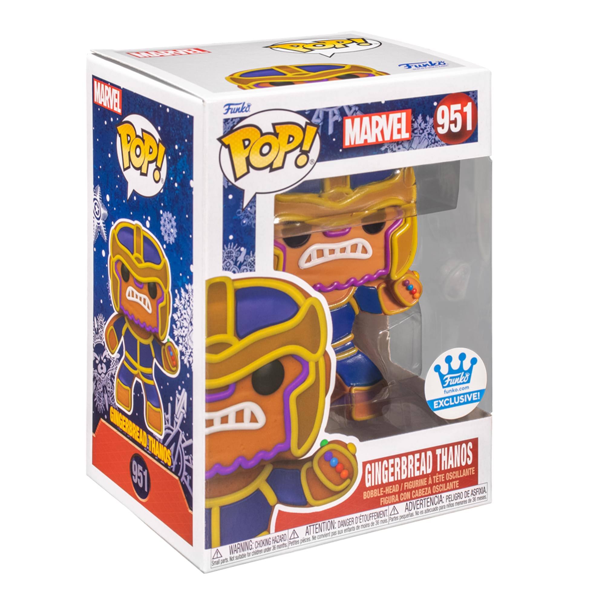 Sure, here is the corrected and grouped text from the image:

---

**Front:**
- MARVEL
- POP!
- 951
- GINGERBREAD THANOS
- EXCLUSIVE!
- Funko.com

**Side:**
- MARVEL
- POP!
- GINGERBREAD THANOS
- 951

**Bottom:**
- GINGERBREAD THANOS
- BOBBLE-HEAD / FIGURINE À TÊTE OSCILLANTE
- FIGURA CON CABEZA OSCILLANTE
- FIGURA CON CABEZA OSCILLANTE
- ATTENTION: DANGER DE CHOKING
- ADVERTENCIA: PEQUEÑOS OBJETOS PELIGROSOS
- WARNING: CHOKING HAZARD - Small parts. Not for children under 3 years.

**Top:**
- MARVEL
- 951

**Additional Text:**
- Funko
- Funko.com exclusive!

---