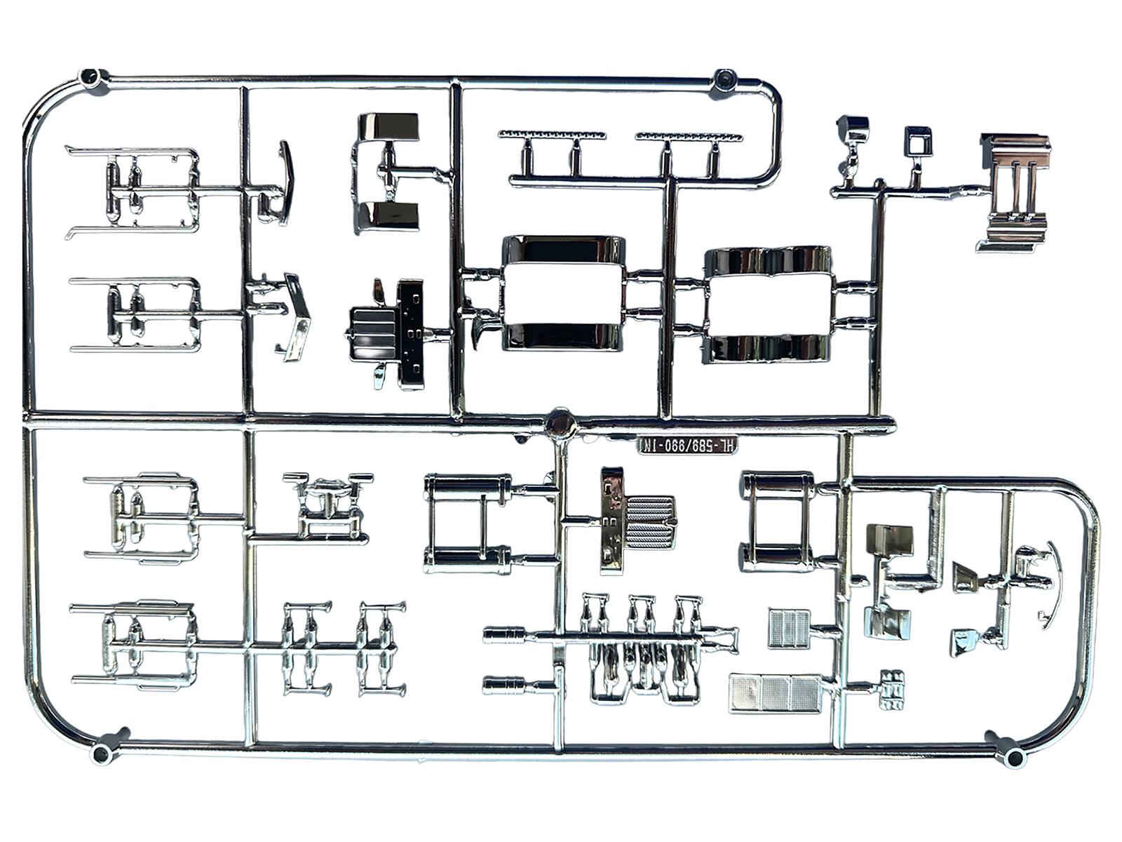 Left. HO Logistics Replicas - Chrome Plated Parts for Peterbilt 589 and Kenworth W990 Trucks 1/87 (HO) Plastic Model by HO Logistics - Chrome.