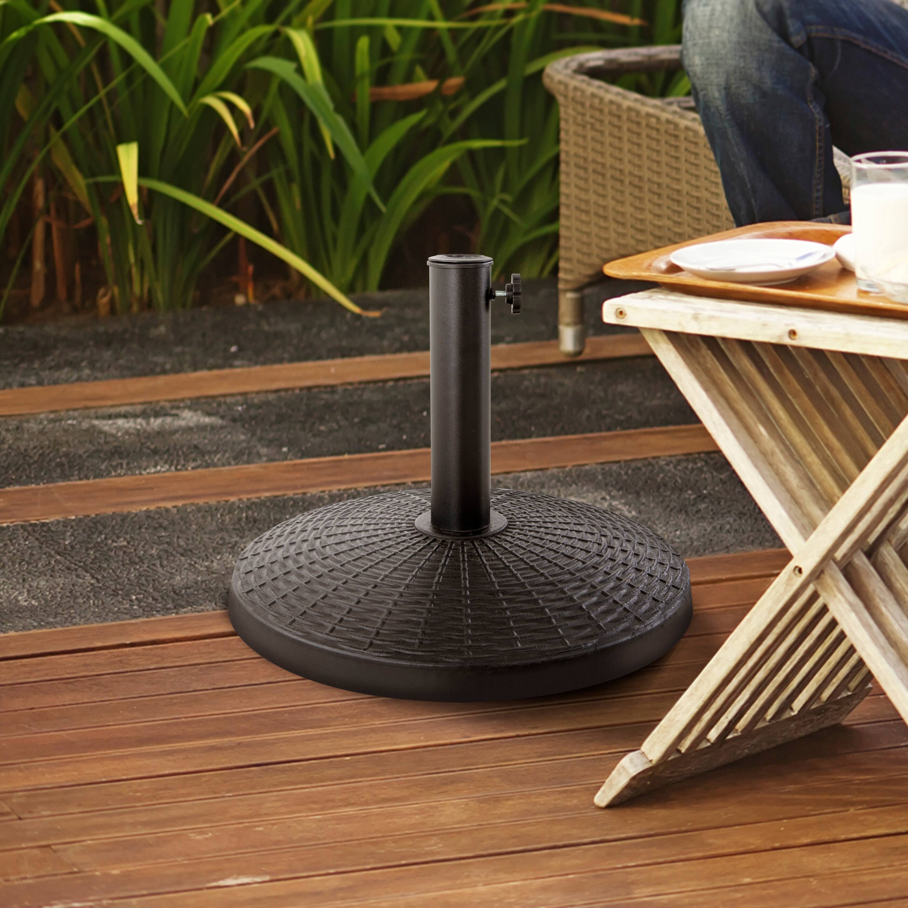 Angle. Nuu Garden - Outdoor 22 lb. Round Black Patio Umbrella Base, Resin and Concrete - Black.