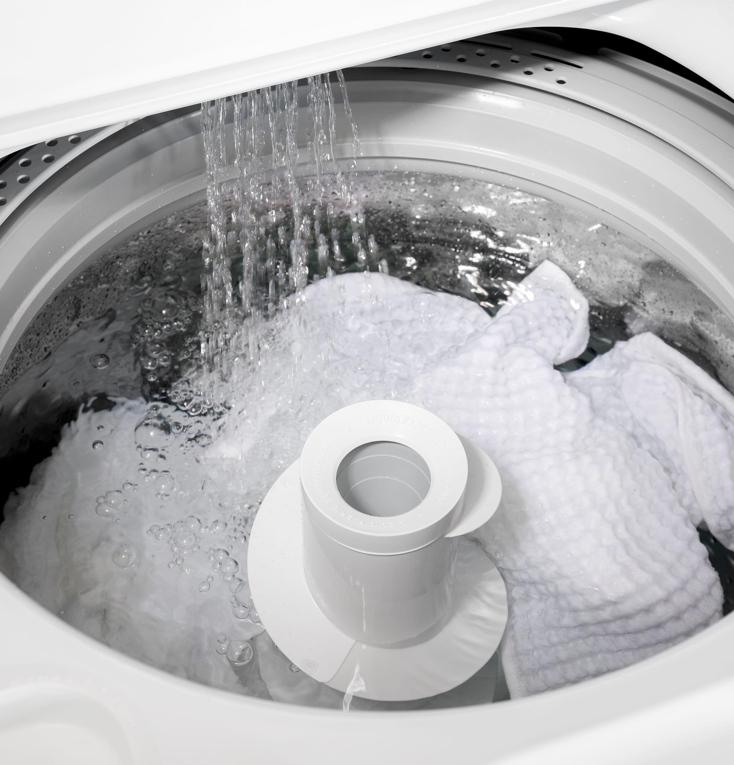 GE GE - 4.3 Cu. Ft. High-Efficiency Top Load Washer with 5 Year Limited Parts and Labor Warranty - White with Black Stainless Steel 14