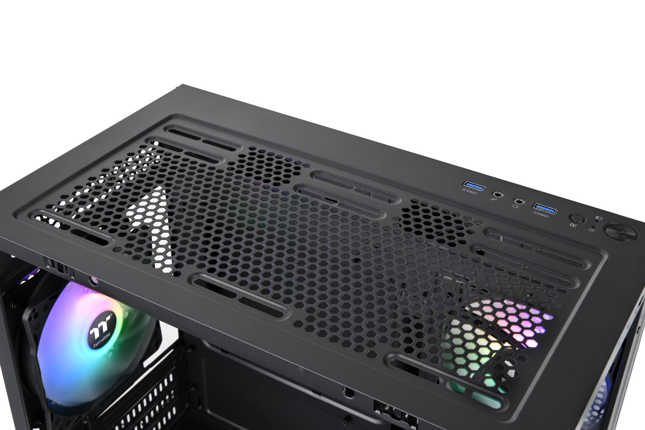 A computer tower with a CD drive and a rainbow colored disc.