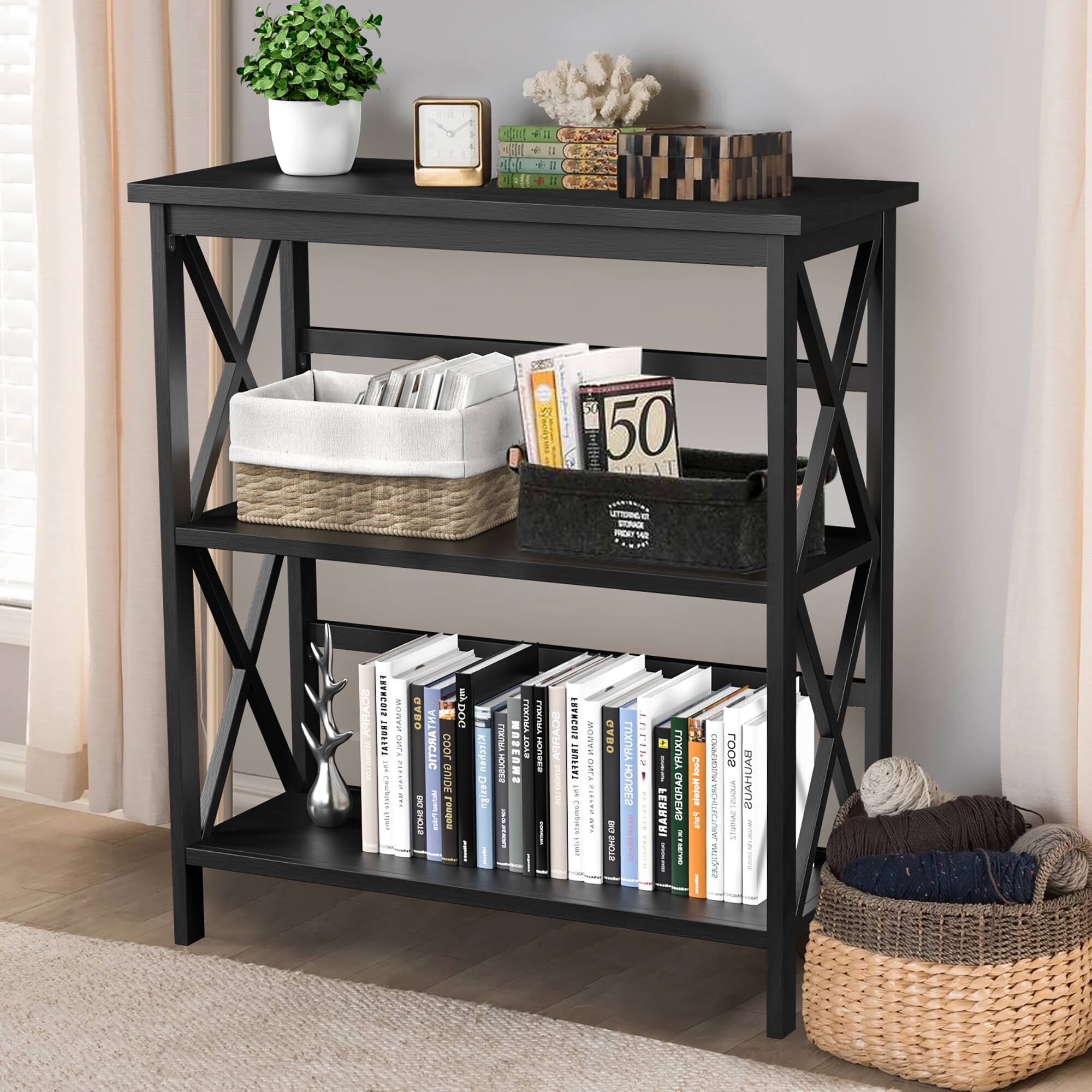 A black bookshelf with a variety of books on it. The books are arranged in different sizes and orientations, creating a visually interesting display. The shelf also has a potted plant on top, adding a touch of greenery to the space. The books are organized in a way that makes it easy to find and access them, making the bookshelf a functional and aesthetically pleasing addition to the room.