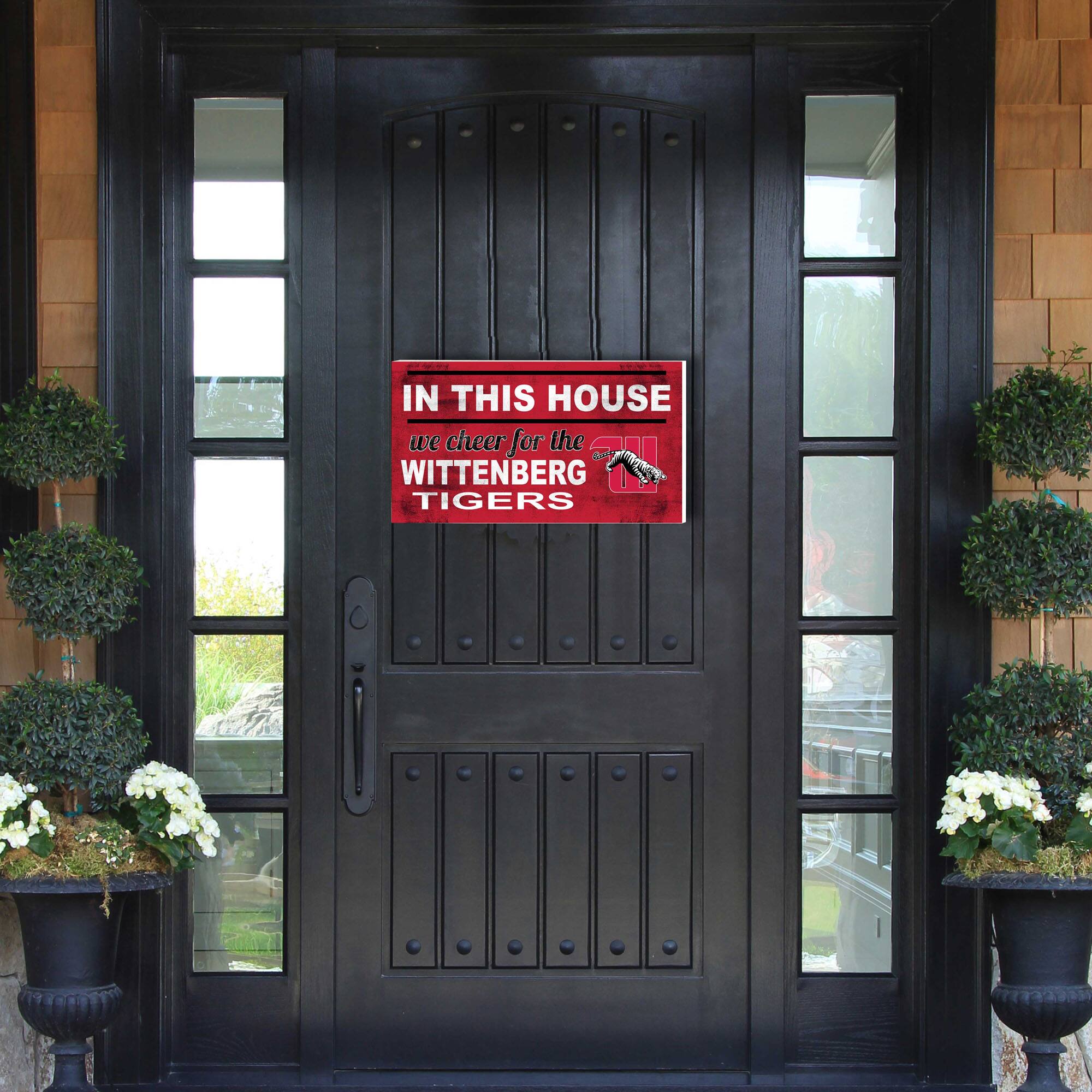 IN THIS HOUSE  
we cheer for the  
WITTENBERG TIGERS