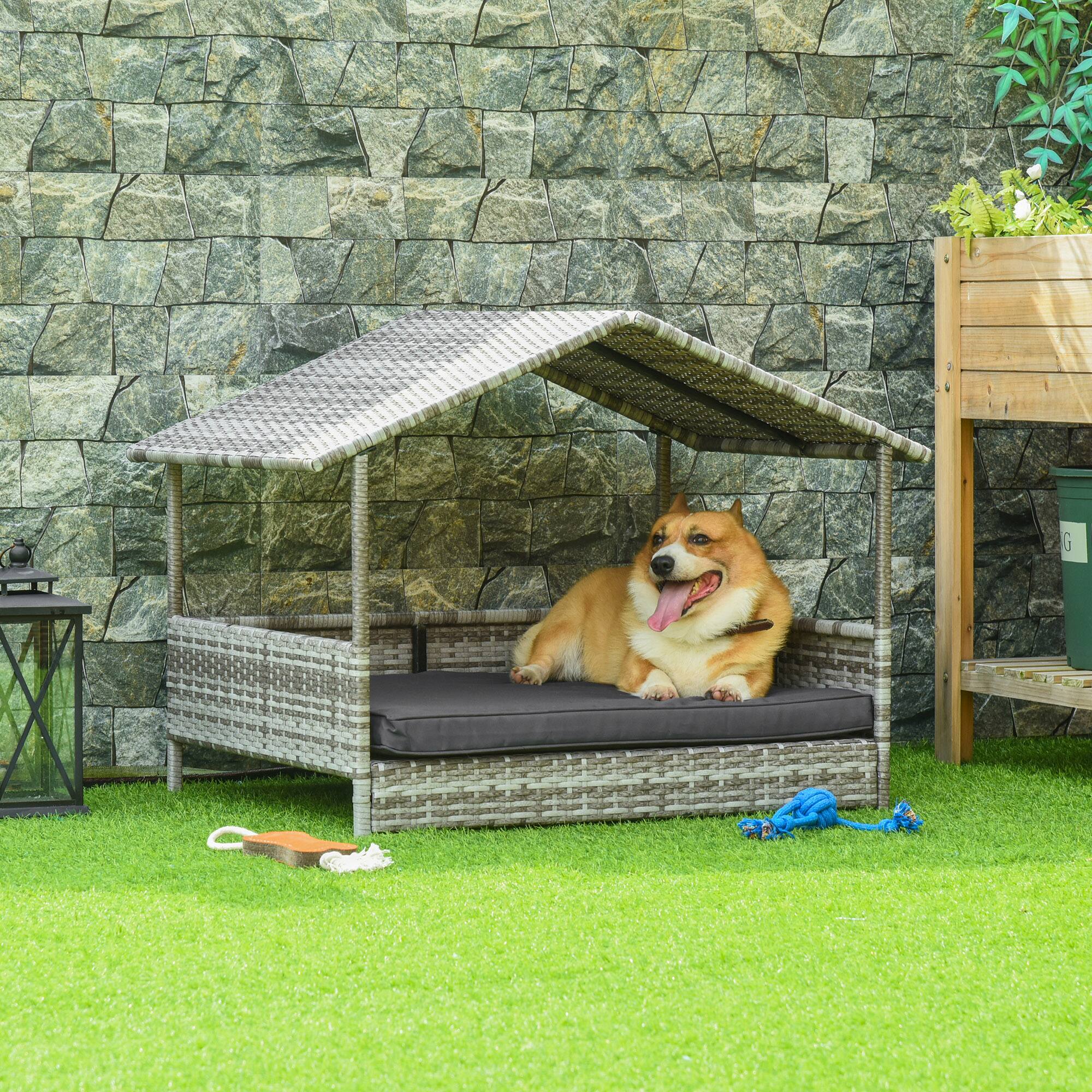 Angle. Siljoy - Outdoor Wicker Dog House with Canopy, Water‑Resistant Cushion & Raised Base for Small/Medium Dogs.