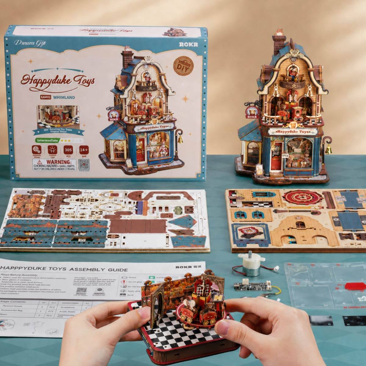 Dream Gip  
ROKR  
Happyduke Toys EAM01 WHIMLAND  
DIY  
Tay Display  
BOKE  
sHoppydake Toys E  
ROKA  
sHappyduke Toysa  
Intermediate  
305  
14+  
PCS WARNING: CHOKING HAZARD SMALL PARTS NOT FOR CHILDREN UNDER 3 YEARS  
HAPPPYDUKE TOYS ASSEMBLY GUIDE Read Before Assembly  
ROKR  
For guidance  
mat  
kage Contents Flywood Alments Accessories Beg  
And 1 PCS / PCS Actify Unents 2 PCS -  
LAANDA  
R
