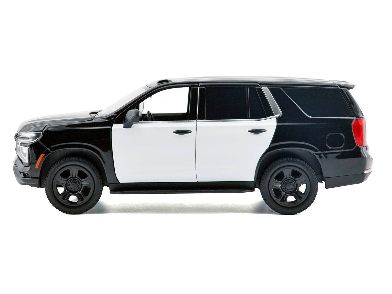 Left. Motormax - 2025 Chevrolet Tahoe PPV Black and White "Custom Builder's Kit - Law Enforcement and Public Service" Series 1/24 - Black and White.