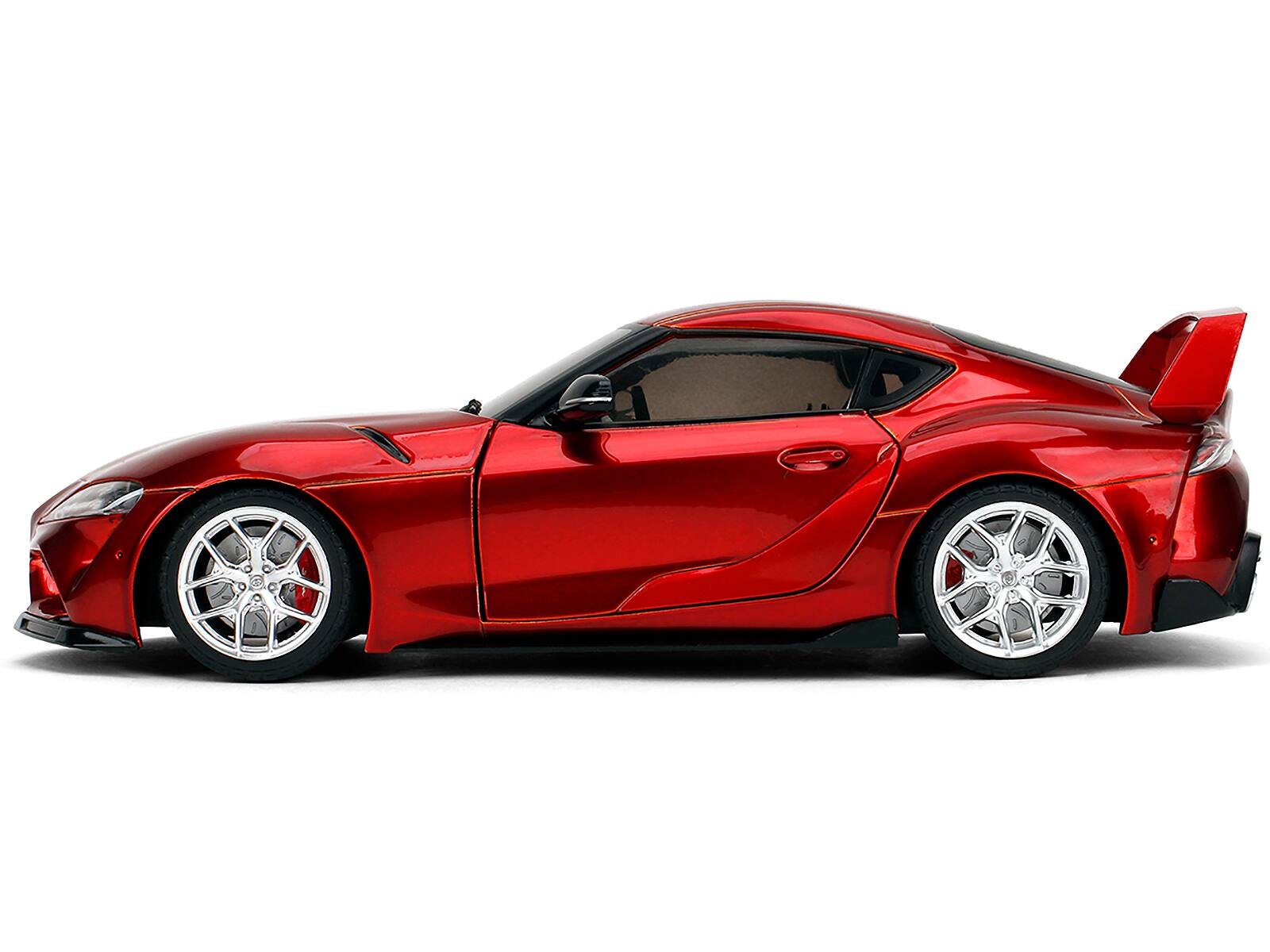 Left. Jada - Toyota GR Supra Red Metallic "Pink Slips" Series 1/18 Diecast Model Car by Jada - Red.