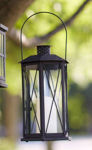 Front. Melrose - 14.5" Black Cottage Style Glass Lantern with LED Flameless Pillar Candle - Black.