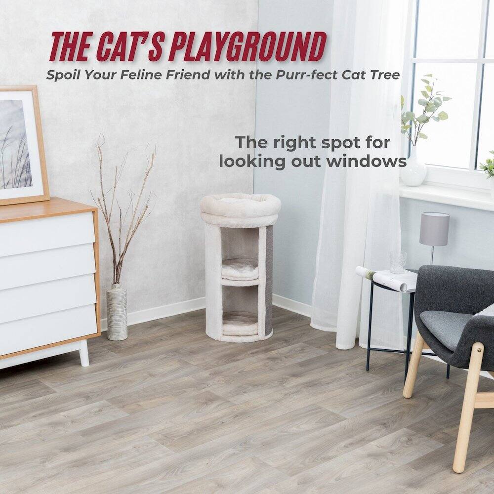 THE CAT'S PLAYGROUND  
Spoil Your Feline Friend with the Purr-fect Cat Tree  

The right spot for looking out windows