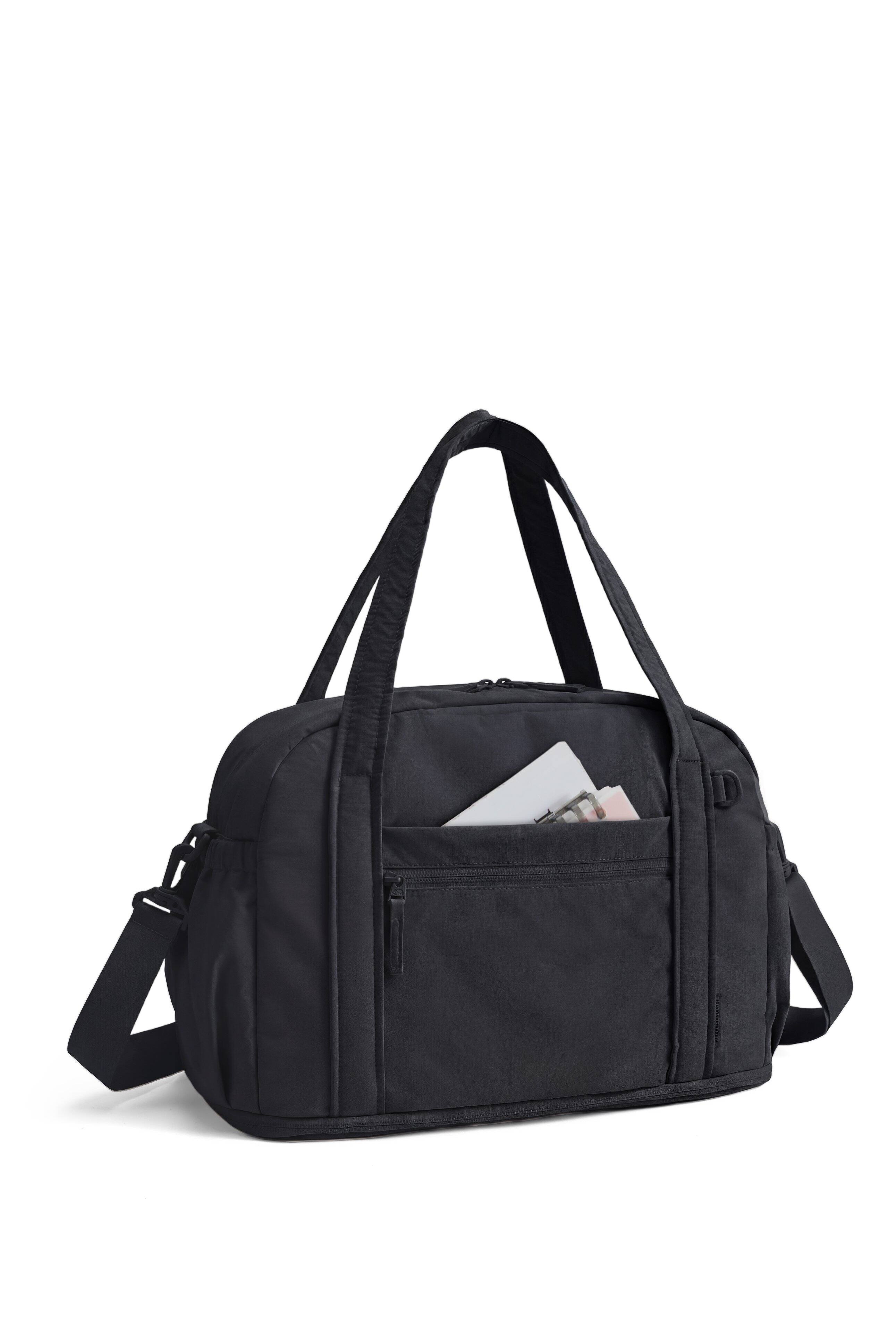 Angle. Bagsmart - Expandable Travel Duffle Bag, Water-Resistant Weekender with 14" Laptop Pocket for Gym & Travel - Black.