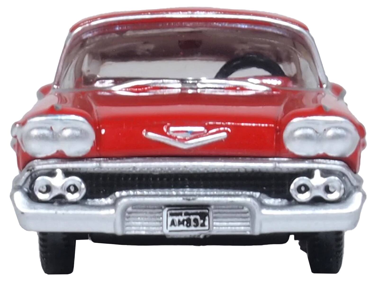 Left. Oxford Diecast - 1958 Chevrolet Impala Sports Coupe Rio Red 1/87 (HO) Scale Diecast Model Car by Oxford Diecast - Red.