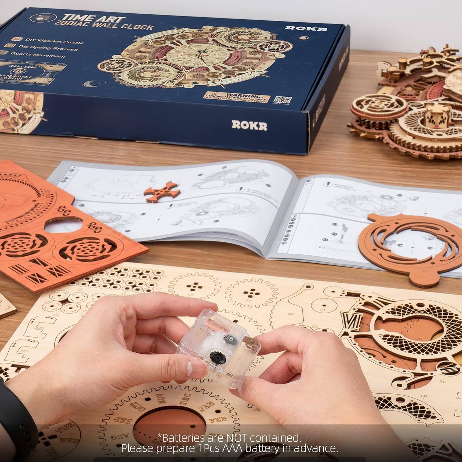 TIME ART ZODIAC WALL CLOCK  
DIY Wooden Puzzle  
Dip Dyeing Process  
Quartz Movement  

ROKR  

WARNING  

* Batteries are NOT contained.  
Please prepare 1Pcs AAA battery in advance.