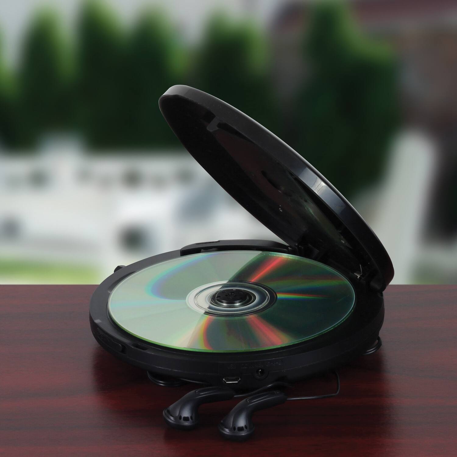 Left. Jensen - JENSEN CD60RBT Personal Portable Bluetooth CD Player with Digital FM Radio and Earbuds - Black.