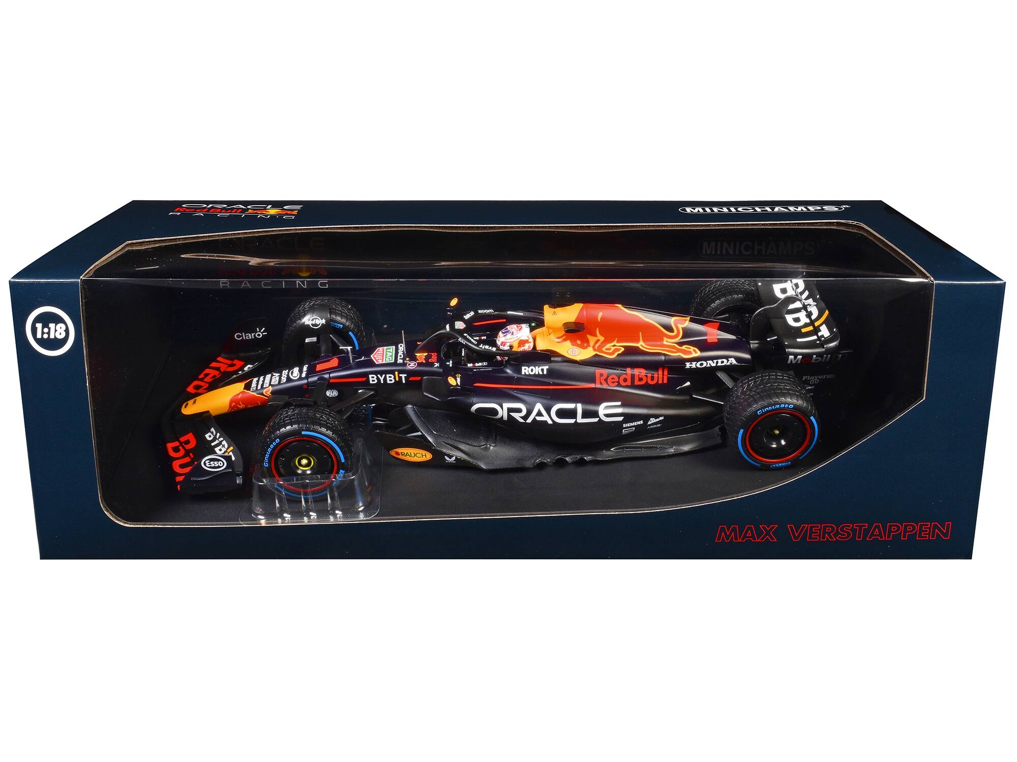 Sure, here is the corrected and grouped text from the image:

- **BRABHAM**
- **MINICHAMPS**
- **1:18**
- **Claro**
- **Red Bull**
- **HONDA**
- **ORACLE**
- **MAX VERSTAPPEN**
- **BYBIT**
- **ROKT**
- **ESSO**
- **BAUCH**
- **Mobil 1**
- **Pirelli**
- **CINTURATO**