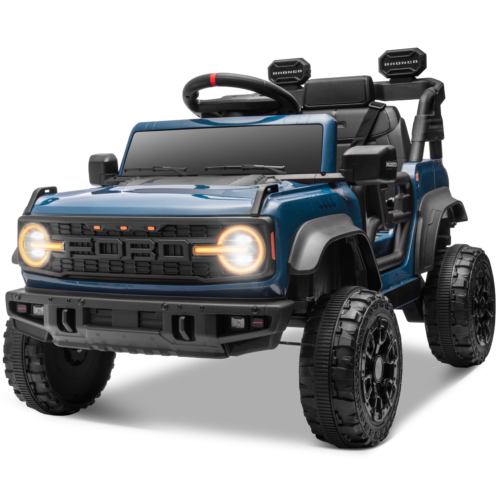 The image shows a blue toy off-road vehicle with black tires and a black roll cage. The vehicle has a prominent front grille with the word "BRONCO" written on it. The headlights are illuminated, and there are additional lights mounted on the roof. The tires have the text "AT TERRAIN" on them.