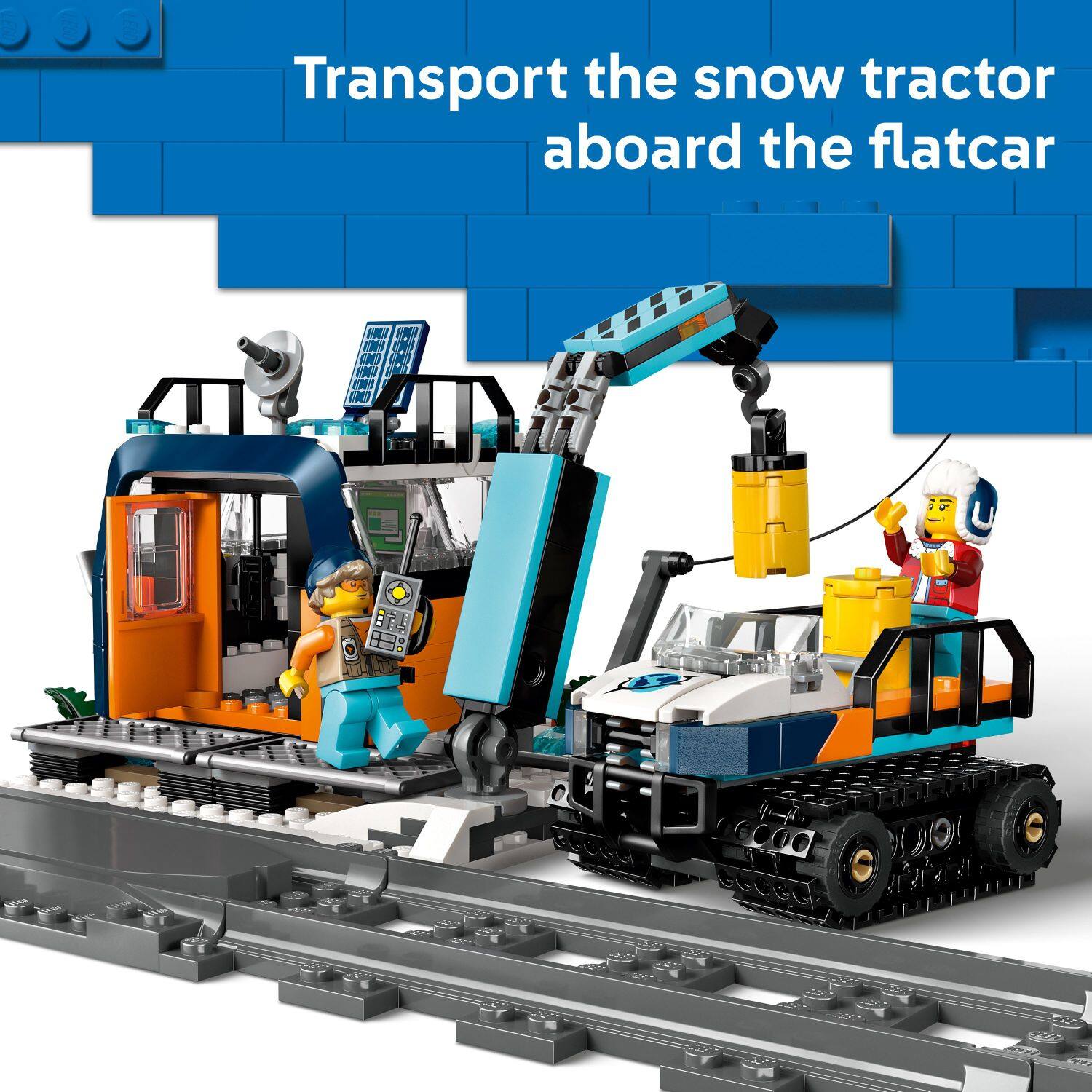 Transport the snow tractor aboard the flatcar.