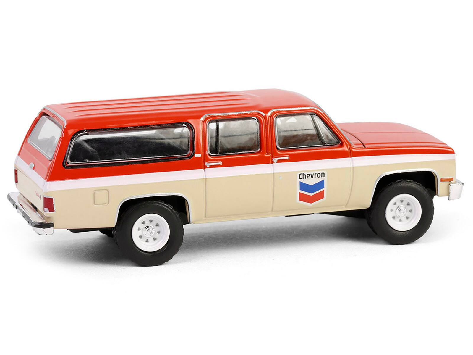 Left. Greenlight - 1988 GMC Suburban Sierra Classic C10 "Chevron" Orange & Beige w/ White Stripes "Chevron Special Edition" 1/64 - Orange and Beige.