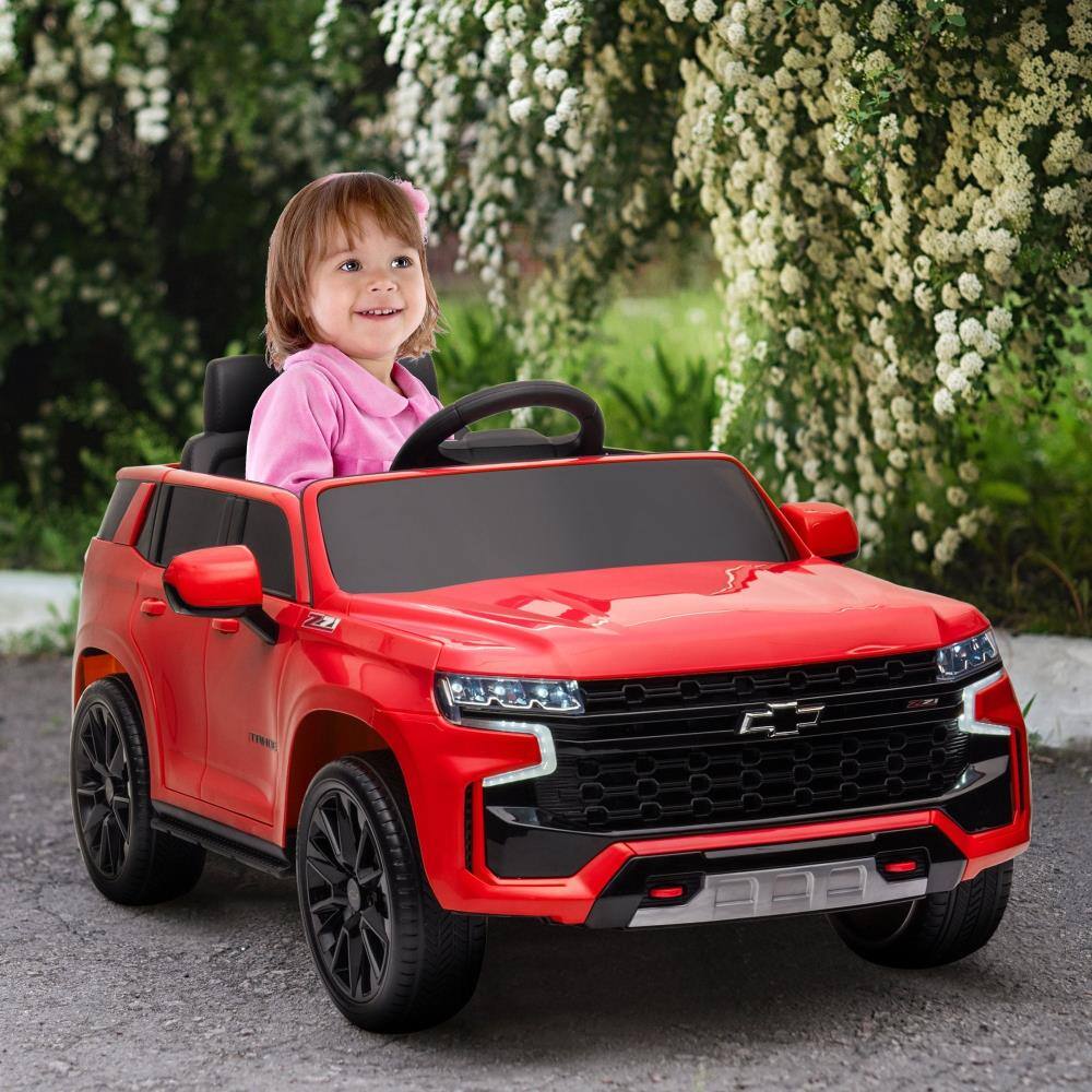 Angle. BreeBe - Aosom 12V Chevrolet TAHOE Licensed Kids ride on Car w/ Remote Control, Music, Lights, Horn, Suspension, Age 3–6 - Red.