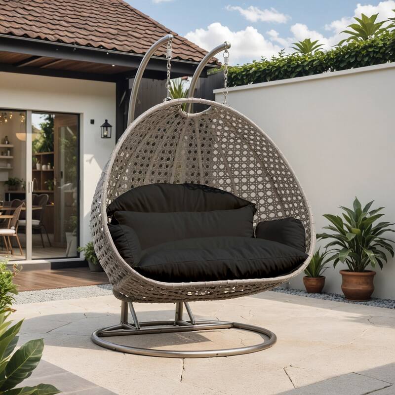 Angle. LeisureMod - Leisuremod 2-Person Wicker Egg Swing Chair with Stand & Washable Cushions - Indoor/Outdoor Double Hanging Patio Chair - Black.