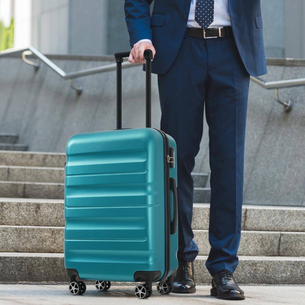 Angle. BreeBe - Hardshell ABS Luggage Set Lightweight Durable Suitcases with Dual Spinner Wheels, Carry-On & Check-In Sizes for Travel - Blue.