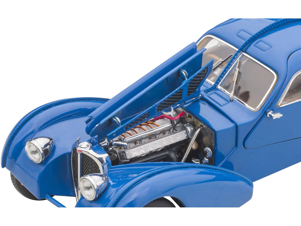 Left. Autoart - 1938 Bugatti Type 57SC Atlantic with Metal Wire-Spoke Wheels Blue 1/43 Diecast Model Car by Autoart - Blue.