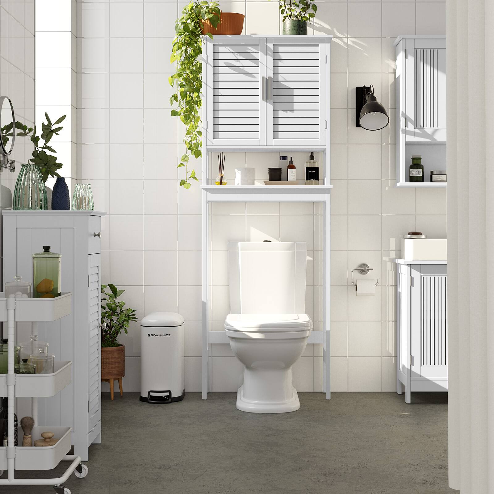 Angle. Songmics Home - Over The Toilet Storage Cabinet, Bathroom Cabinet with Adjustable Inside Shelf and Bottom Stabilizer Bar - Cloud White.