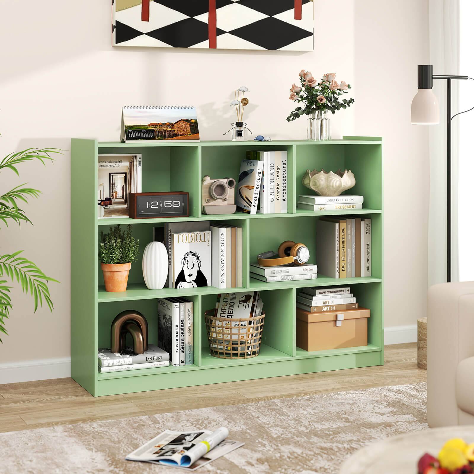 The image features a green bookshelf filled with various books and decorative items. There are at least 12 books of different sizes and colors placed on the shelves. Additionally, there are two vases, one located on the left side of the bookshelf and the other on the right side. A clock is also present on the left side of the bookshelf. The bookshelf is situated in a room with a potted plant nearby, adding a touch of greenery to the space.