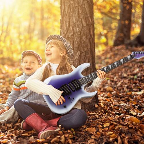 Angle. Winado - 39 Inch Solid Body 6 String 170 Style Electric Guitar with H-H Pickup for Beginner with Portable Bag - Purple.