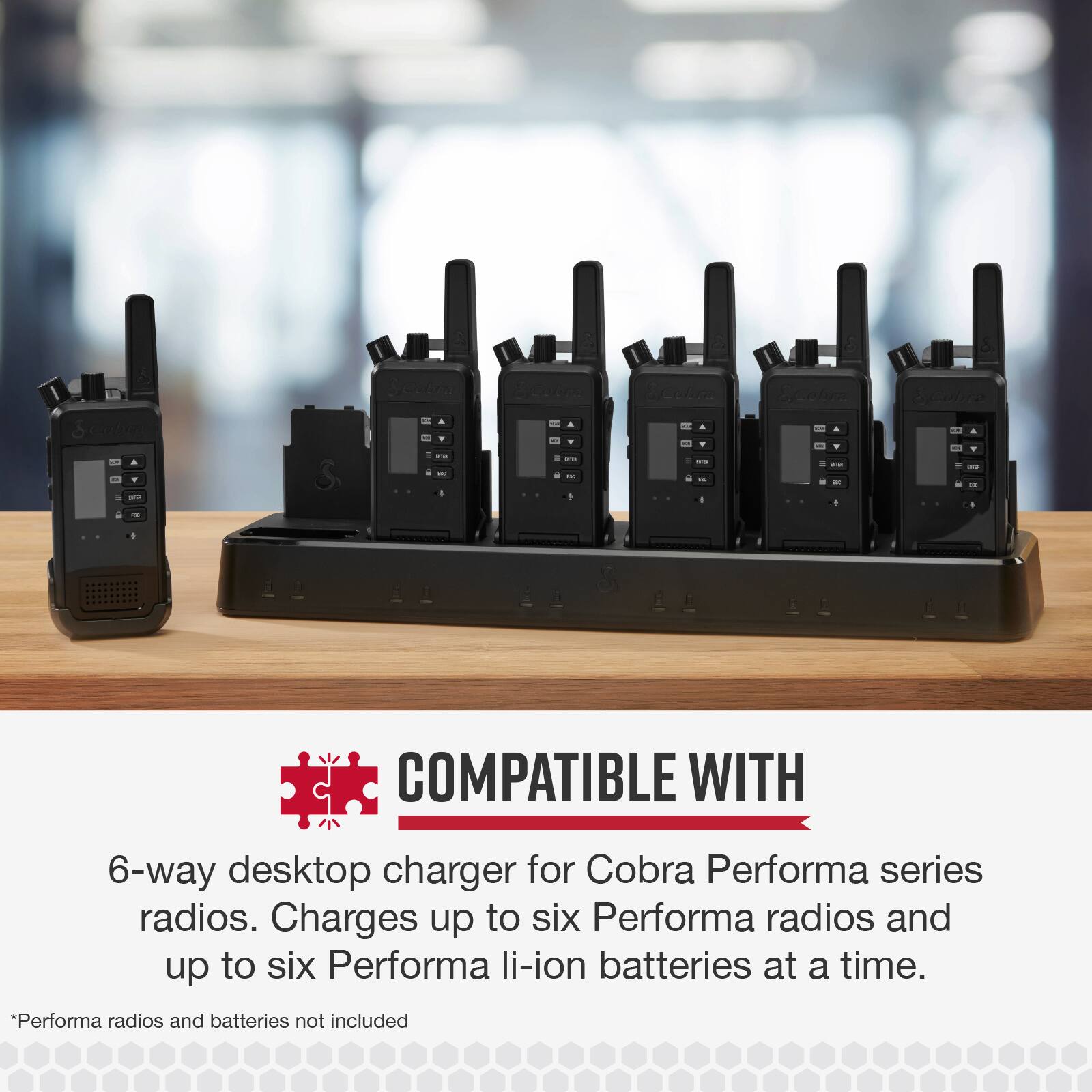The text on the image is already grouped and correctly written. It reads: "Compatible with 6-way desktop charger for Cobra Performa series radios. Charges up to six Performa radios and up to six Performa li-ion batteries at a time. *Performa radios and batteries not included."