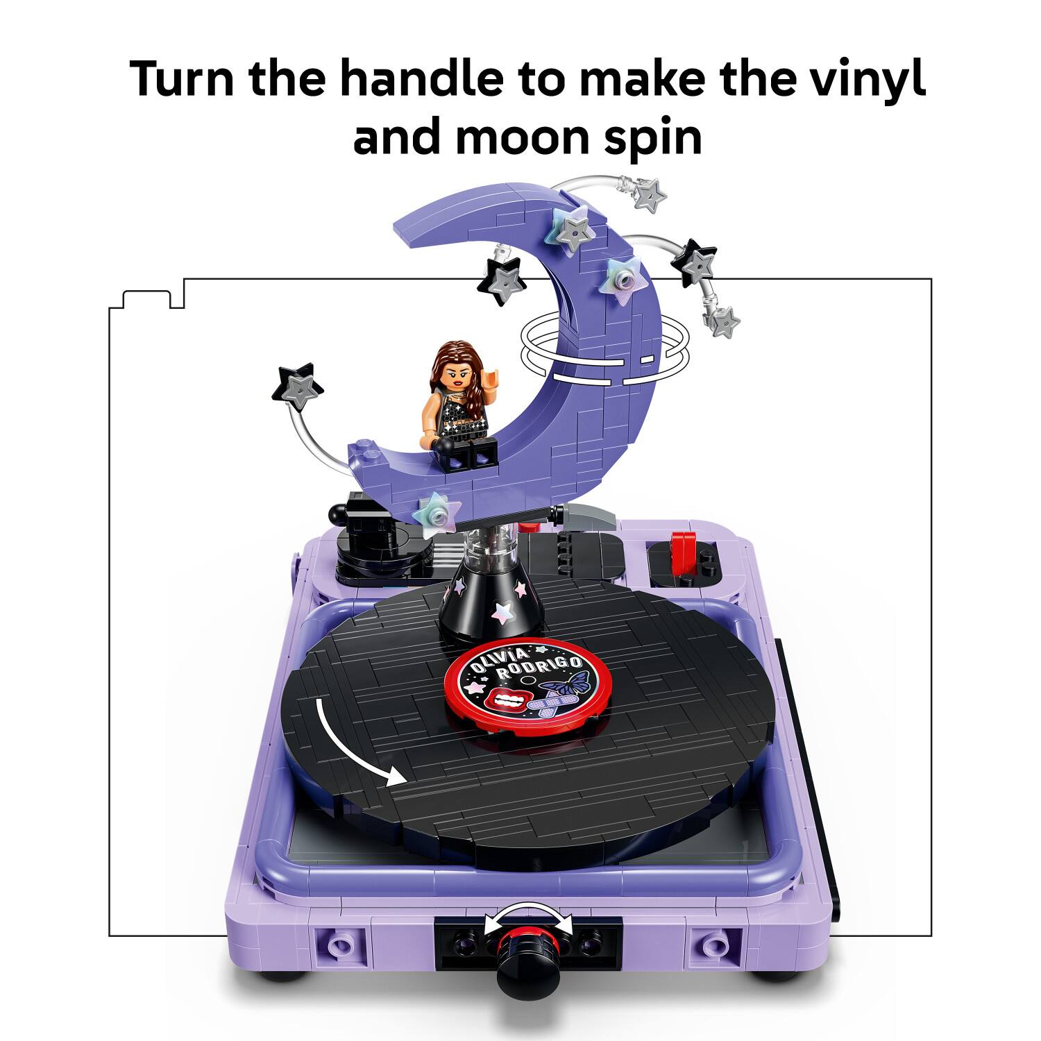 Turn the handle to make the vinyl and moon spin