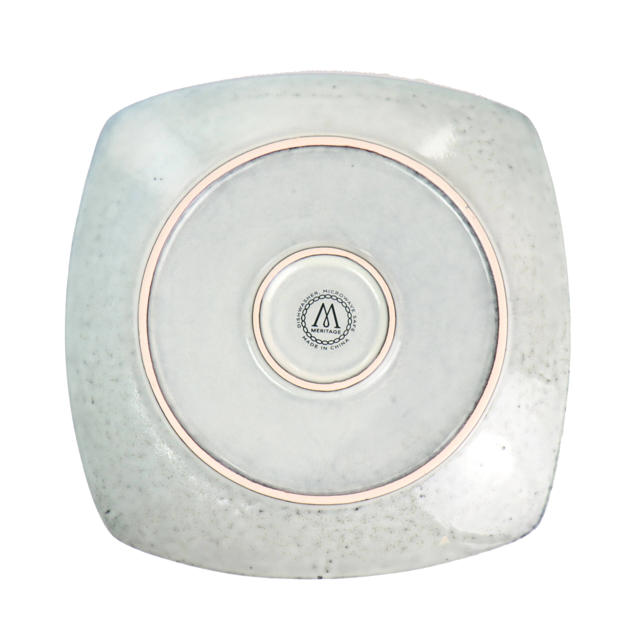 The text on the image reads:

"HERITAGE
MICROWAVE
MADE IN CHINA"