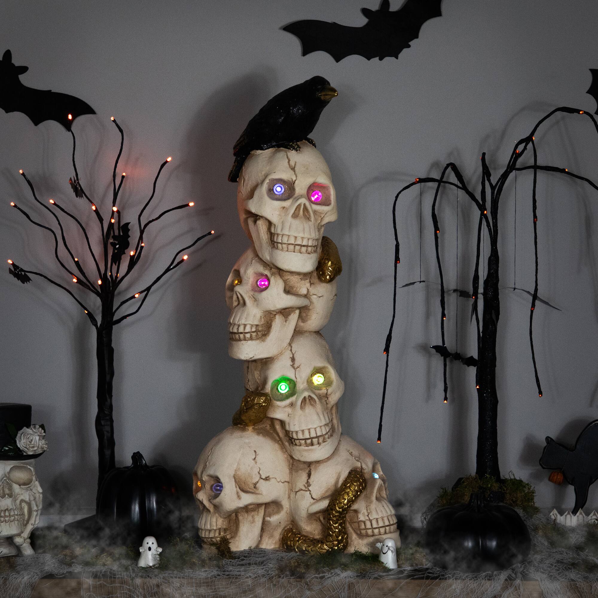 Front. Northlight - LED Lighted Skull Tower with Raven and Snake Halloween Decoration - 27.5" - Multicolor - Beige.