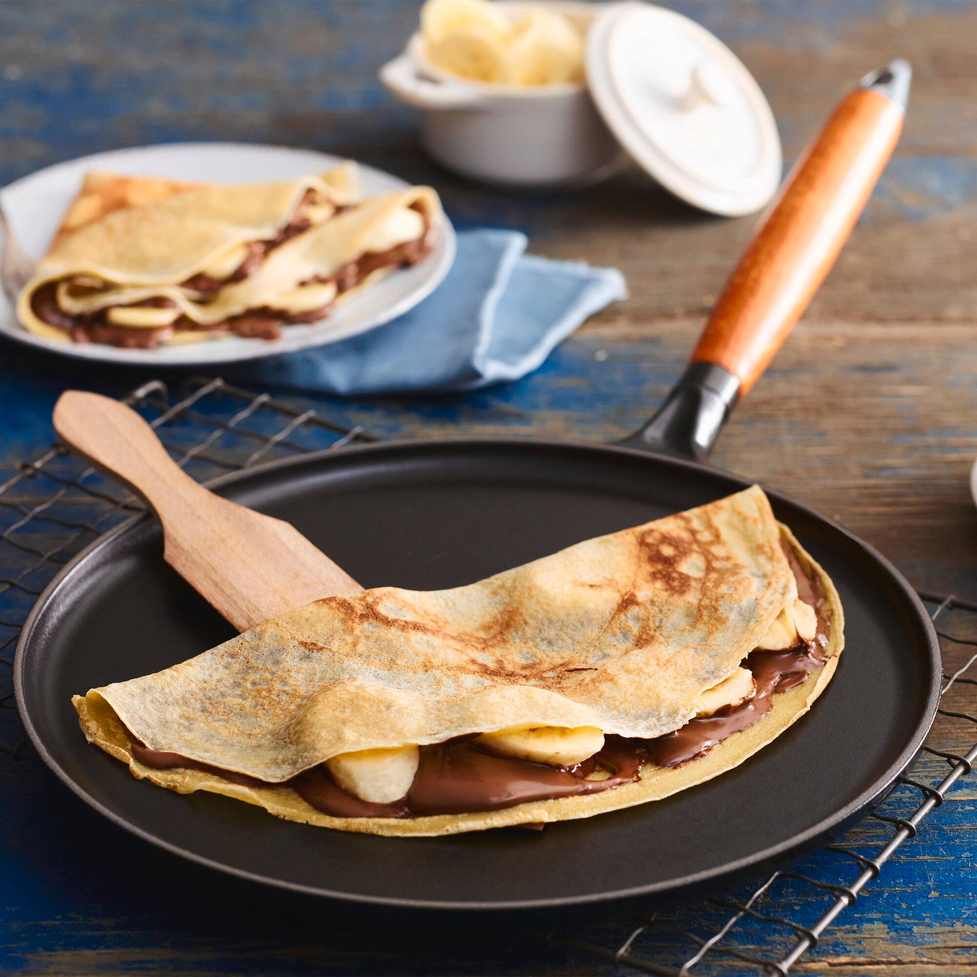 Alt View 4. Staub - Staub Cast Iron 11-inch Crepe Pan with Spreader & Spatula - Matte Black - Matte Black.