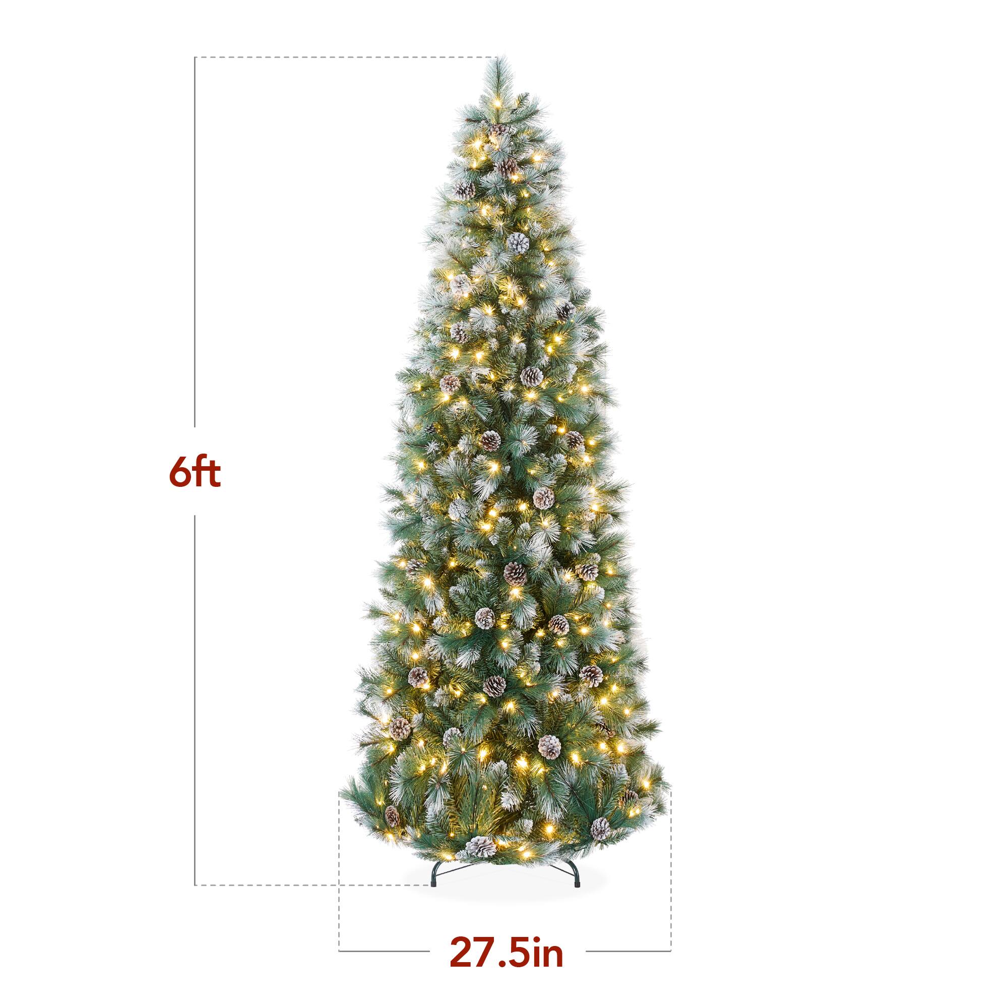 The text on the image indicates the dimensions of the Christmas tree as follows:

- Height: 6 feet
- Width: 27.5 inches

So, the corrected text is: "6ft 27.5in" should be "6ft x 27.5in".